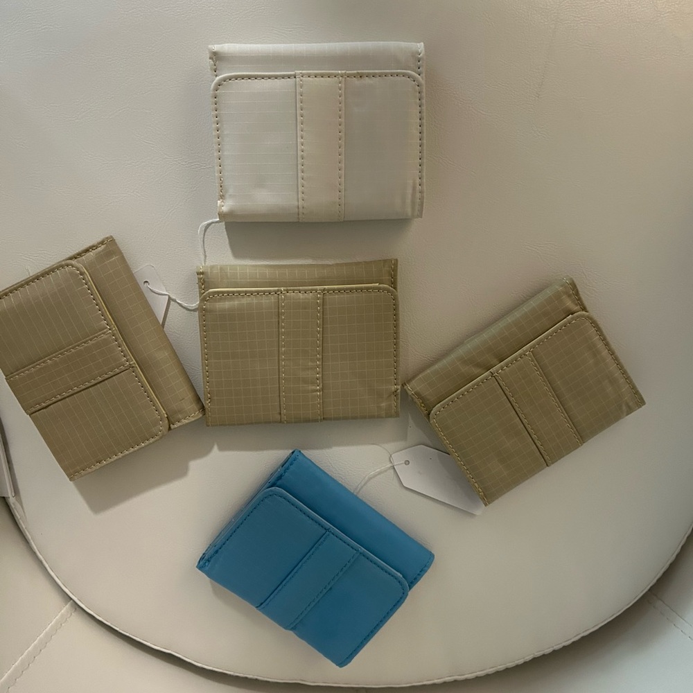 Brand new small wallets.$7 each or 5 for $30. Great little gifts !